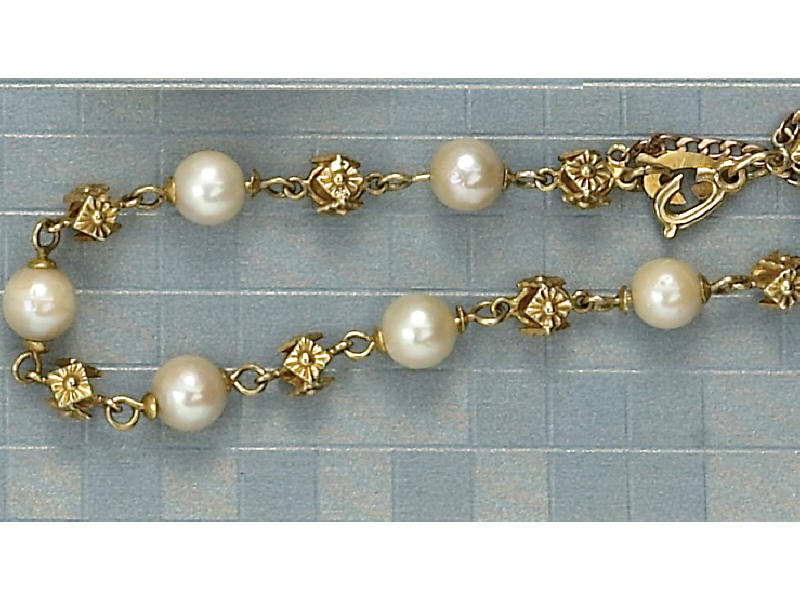 Appraisal: PEARL BRACELET k yellow gold designed links alternating with mm