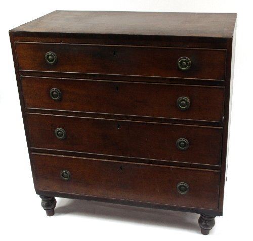 Appraisal: A th Century mahogany chest of four long drawers on