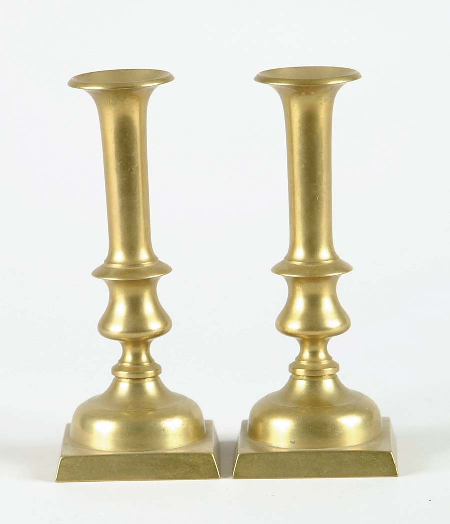 Appraisal: PAIR OF BRASS PUSH UP CANDLESTICKS Square bases with nice