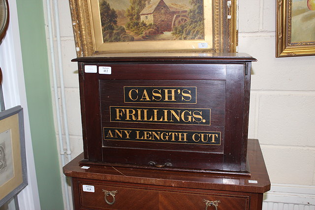 Appraisal: A MAHOGANY CABINET FOR CASH'S FRILLINGS ANY LENGTH CUT the