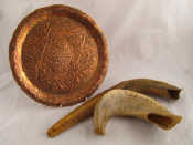 Appraisal: Judaica Two shofar horns together with a heavy copper plate