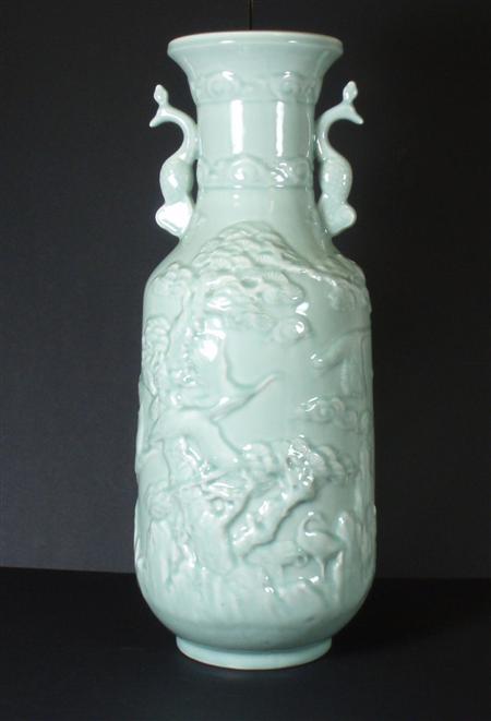 Appraisal: A large Chinese celadon glazed baluster vase with bird handles