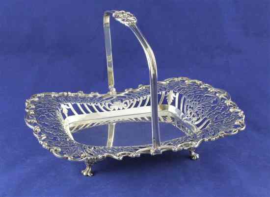 Appraisal: A George V silver cake basket of shaped rectangular form