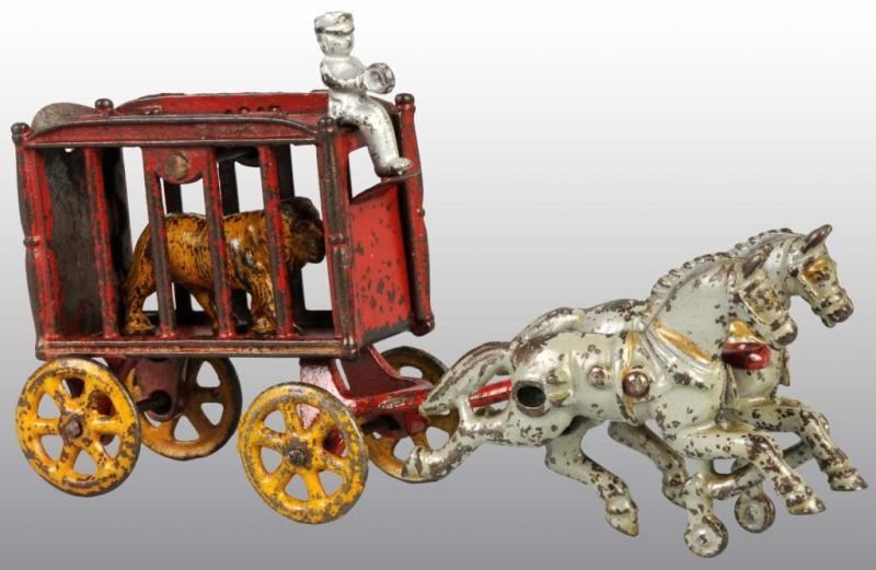 Appraisal: Cast Iron -Horse Royal Circus Cage Wagon Toy Description All