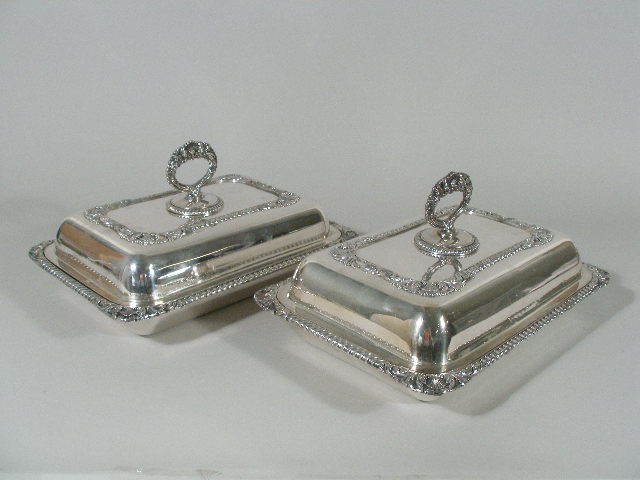 Appraisal: Pair Silver Plated Lidded Entree Servers Georgian style rectangular for