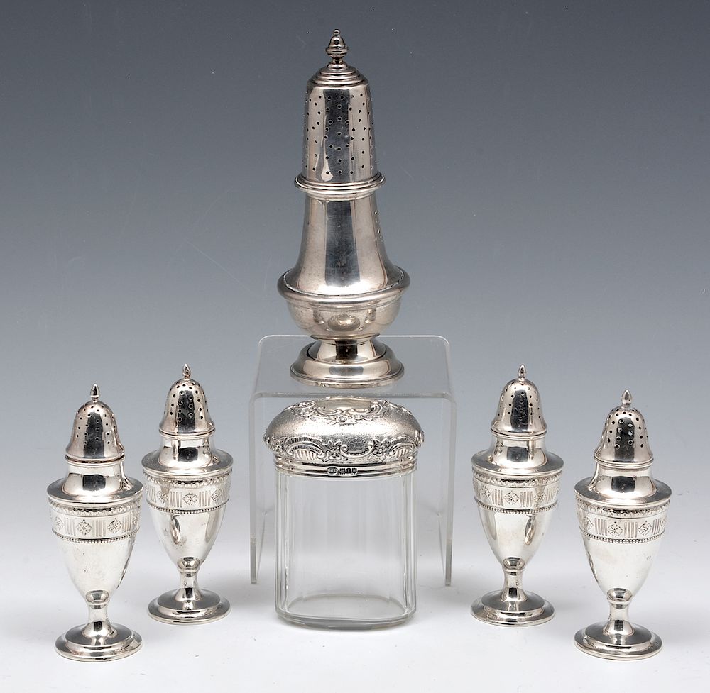 Appraisal: Sterling silver items including four salt pepper shakers a muffineers