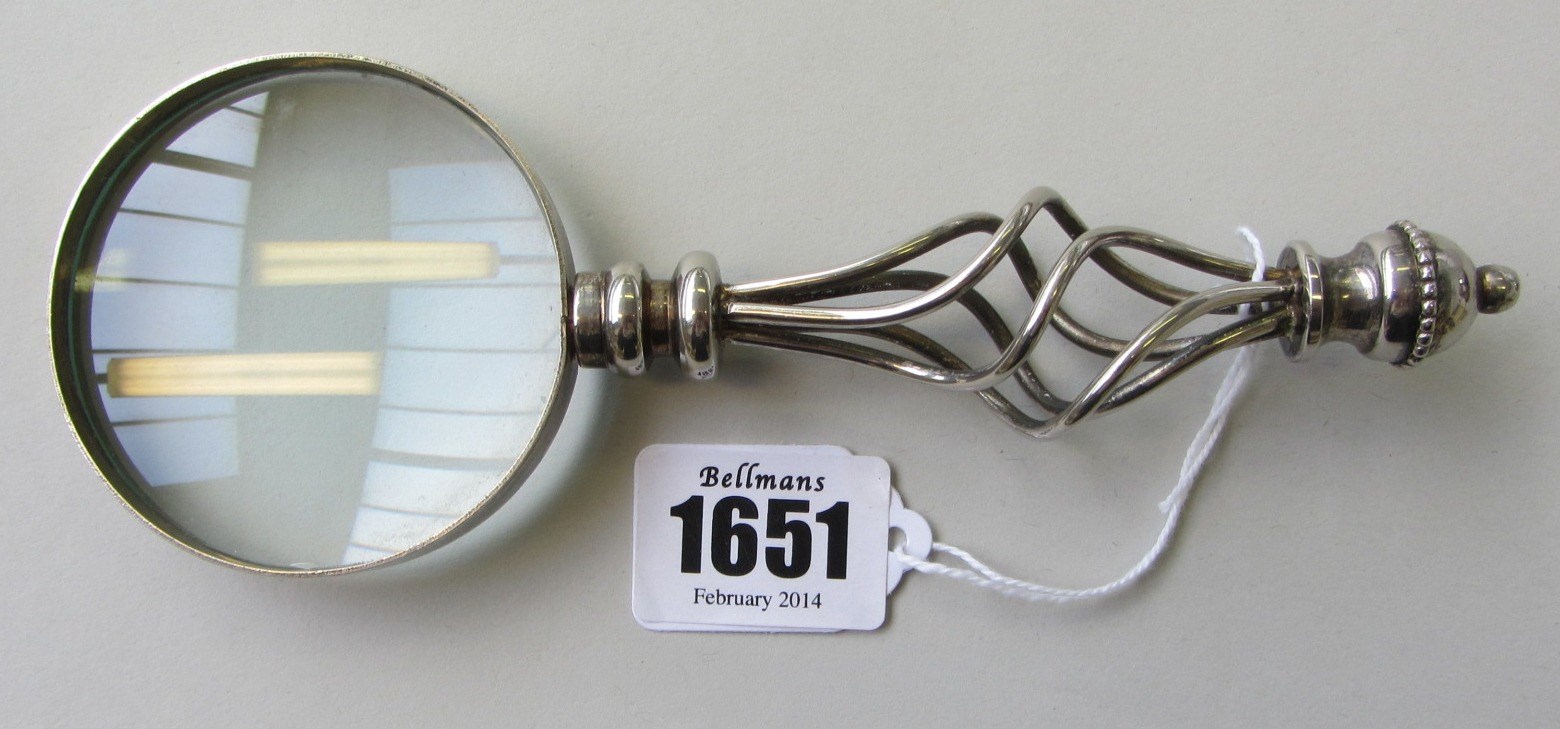 Appraisal: An early th century silver plated magnifying glass of Arts