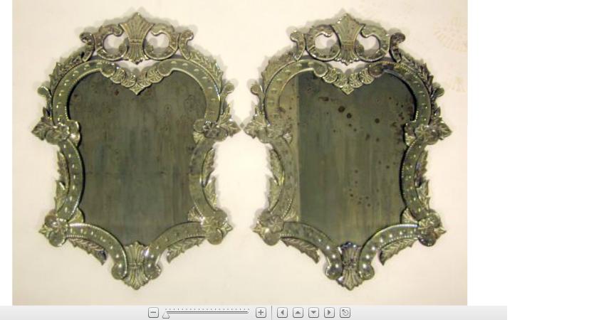 Appraisal: Pair of Venetian style wall mirrorsShield form etched plate flanked