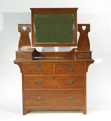 Appraisal: An oak dressing chest six drawers with mirror back cut