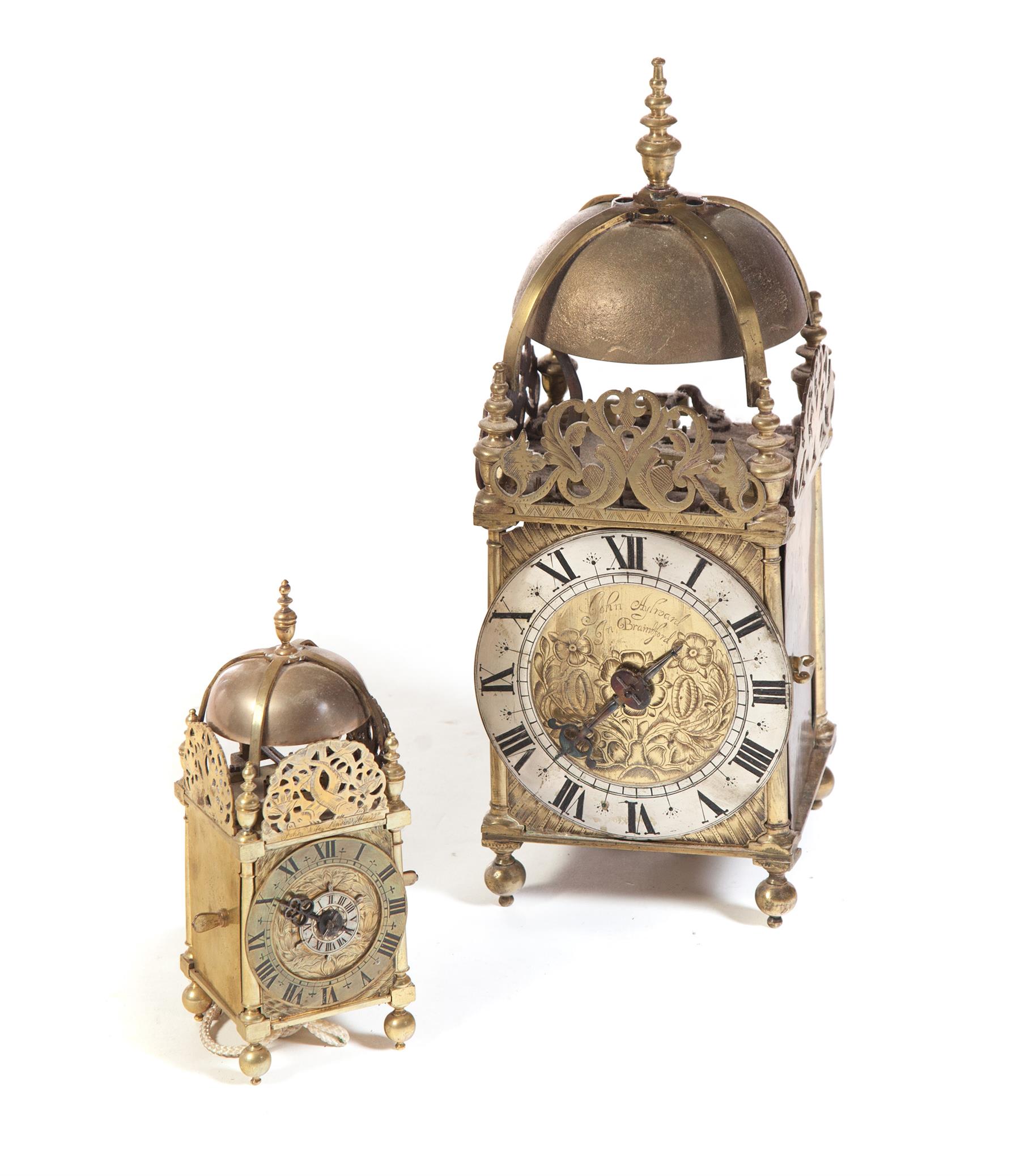 Appraisal: TWO ENGLISH BRASS LANTERN CLOCKS Twentieth century Brass works and