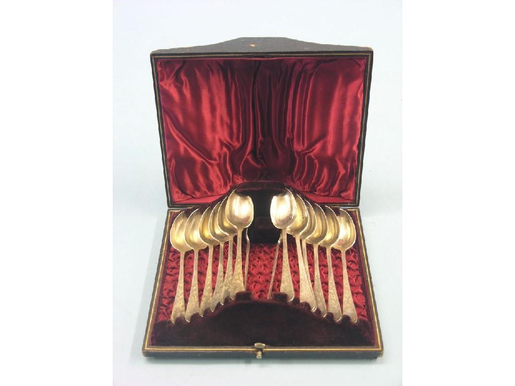 Appraisal: An unusual set of twelve plated teaspoons with engraved ornament