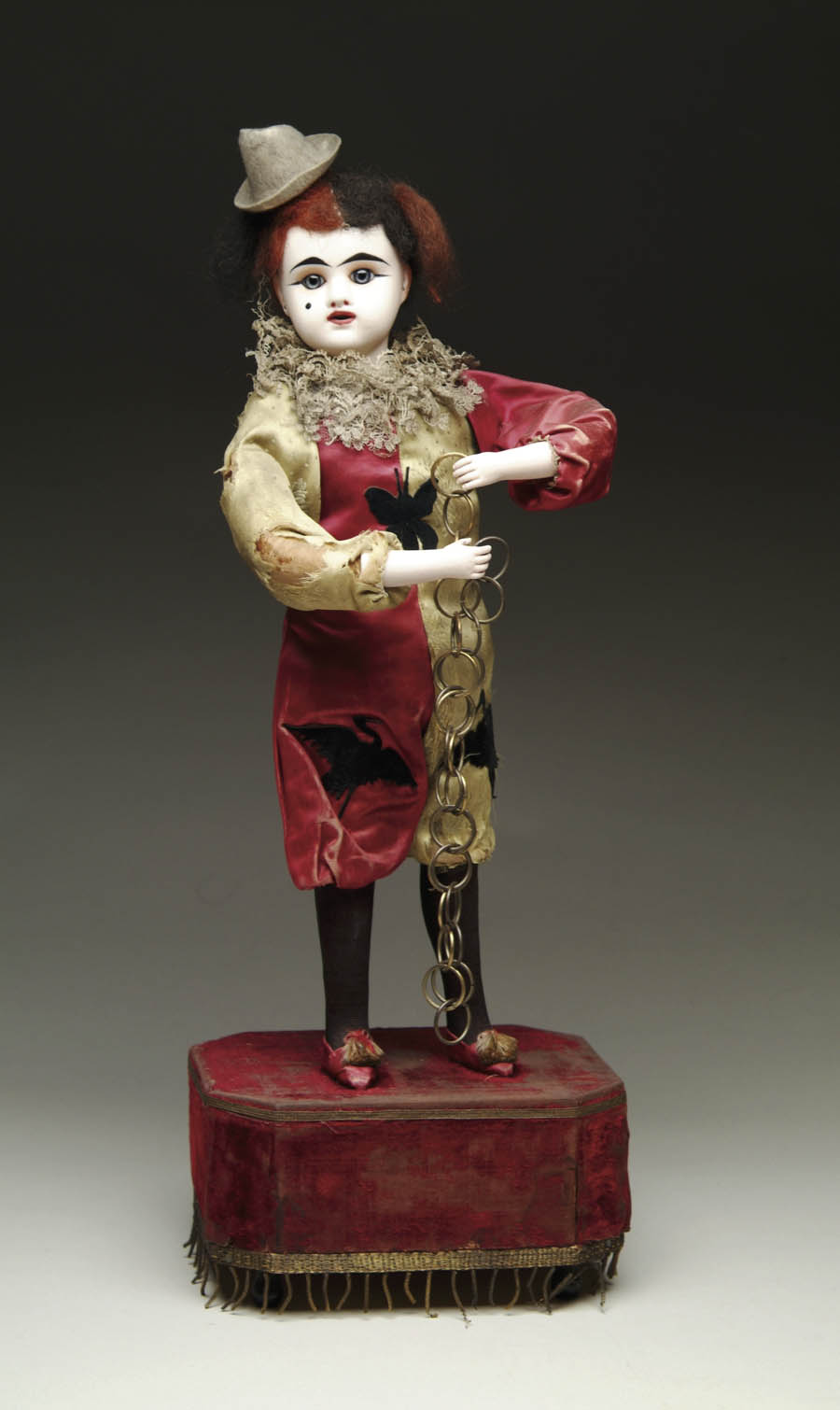 Appraisal: CLOWN AUTOMATON WITH MAGICAL CHAINS A fine French Automaton possibly