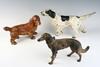 Appraisal: DOOR STOPS - Circa lot of three cast iron dog