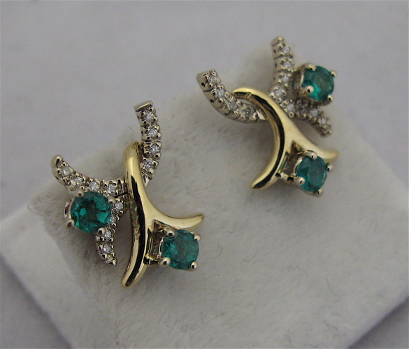 Appraisal: PAIR OF EMERALD AND KARAT WHITE GOLD EARRINGS each set