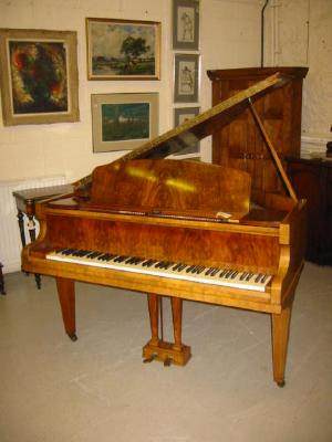 Appraisal: A BABY GRAND PIANO by Challen in walnut case with