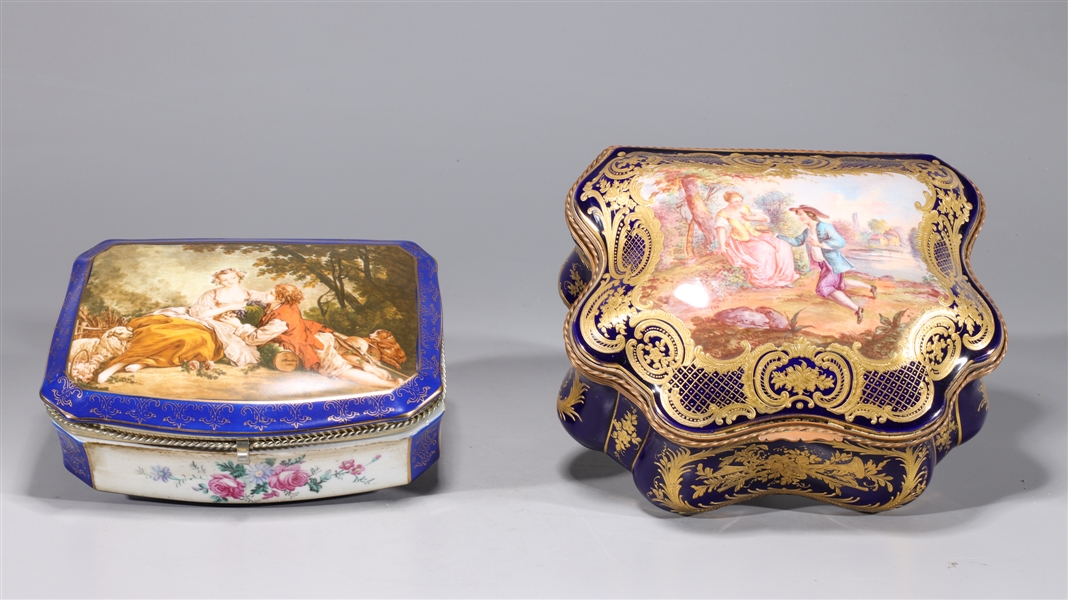 Appraisal: Two gilt porcelain covered boxes each with rococo scenes and