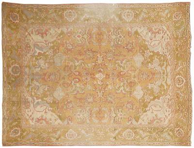 Appraisal: Palace size Oushak rug repeating designs on pale orange field