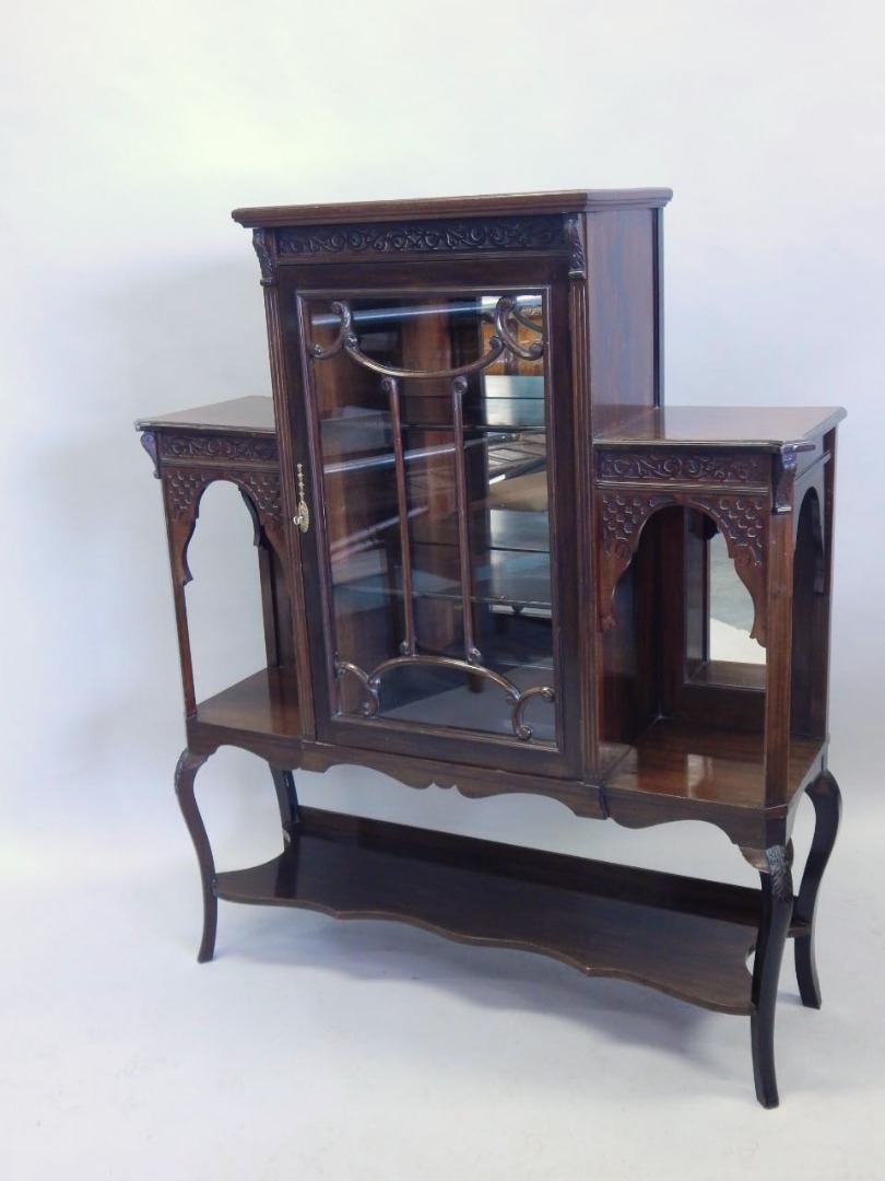 Appraisal: An Edwardian mahogany display cabinet with a central glazed door