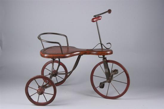 Appraisal: CHILD'S TOY TRICYCLE Wooden seat and handles metal frame wheels