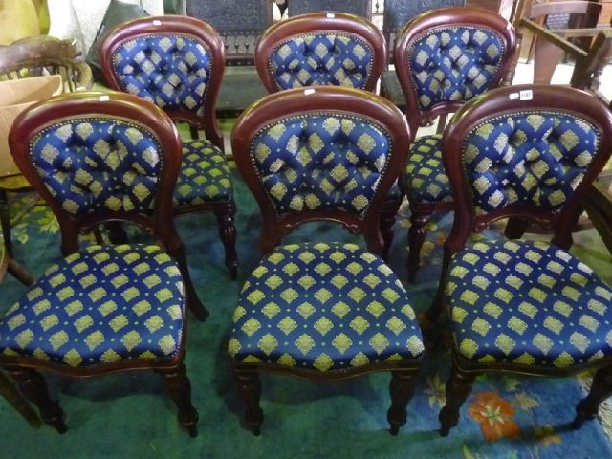 Appraisal: A set of six Victorian style mahogany balloonback dining chairs