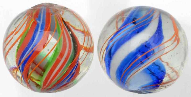 Appraisal: Lot of Divided Core Swirl Marbles Includes one transparent blue