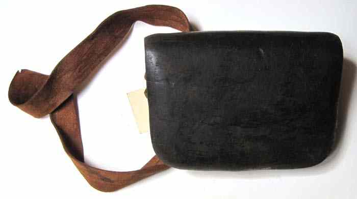 Appraisal: EARLY NINETEENTH CENTURY LEATHER CARTRIDGE POUCH hole wood block for