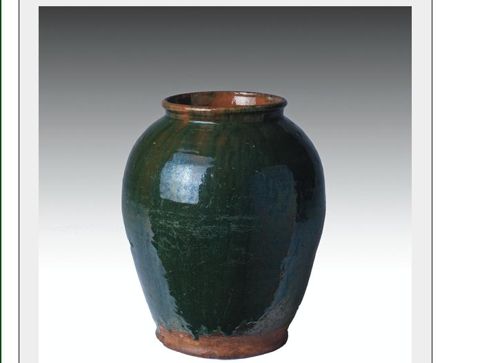 Appraisal: BRISTOL COUNTY MASSACHUSETTS GREEN-GLAZED REDWARE JAR - Of elongated ovoid