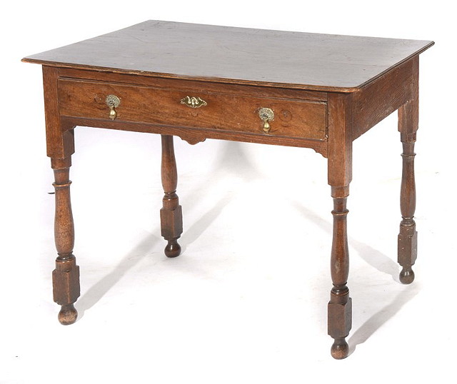 Appraisal: AN ANTIQUE OAK SINGLE DRAWER SIDE TABLE on turned legs