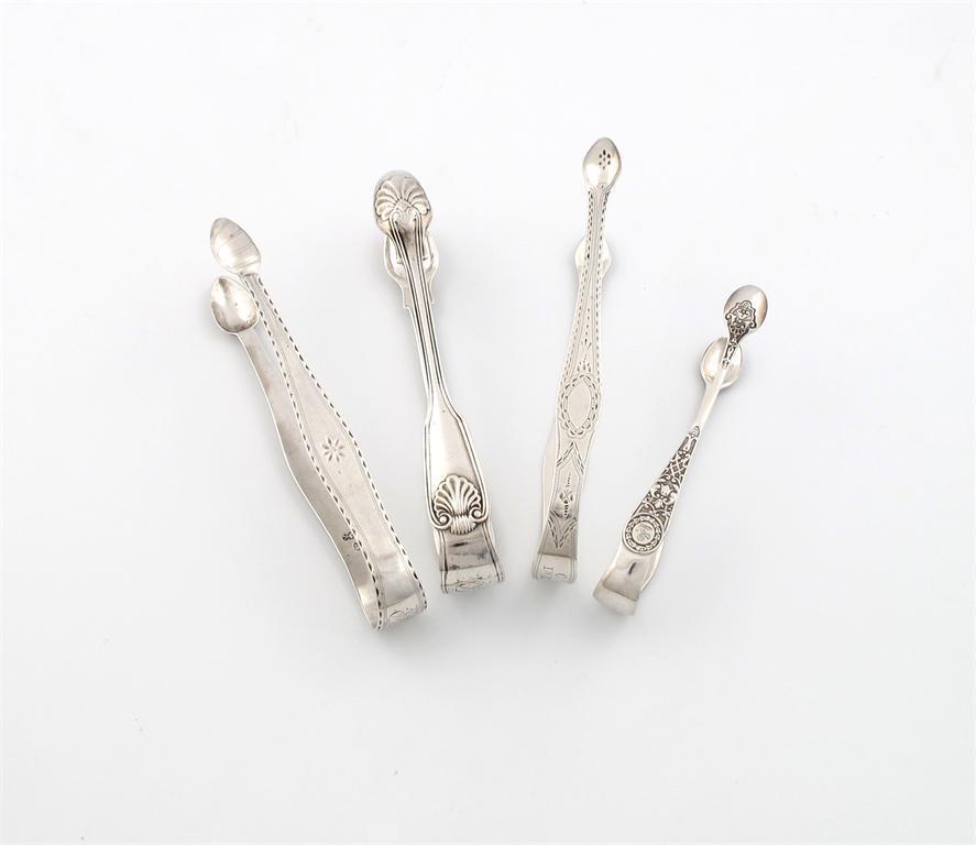 Appraisal: A pair of George III silver Bright-cut sugar tongs