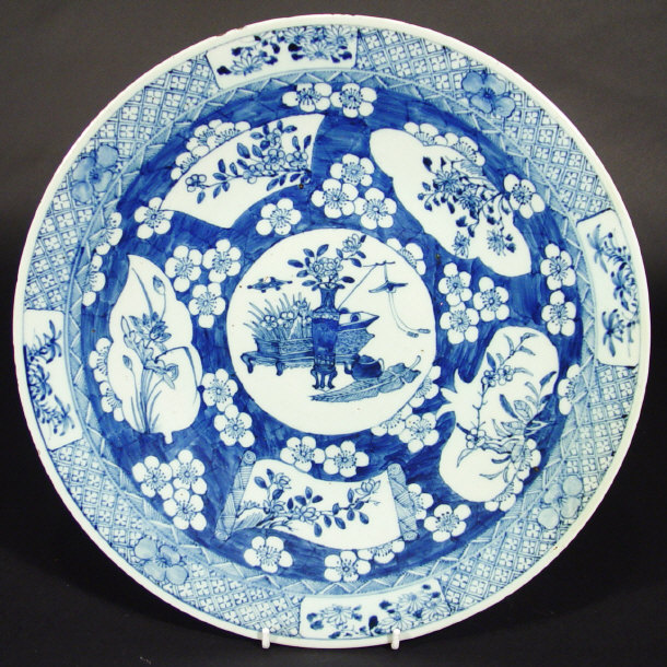 Appraisal: Oriental porcelain charger painted in blue with flowers and objects