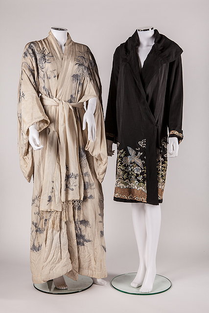 Appraisal: A s black Chinese evening coat with a floral and