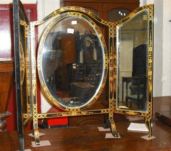 Appraisal: A triptych dressing table mirror with gilded decoration