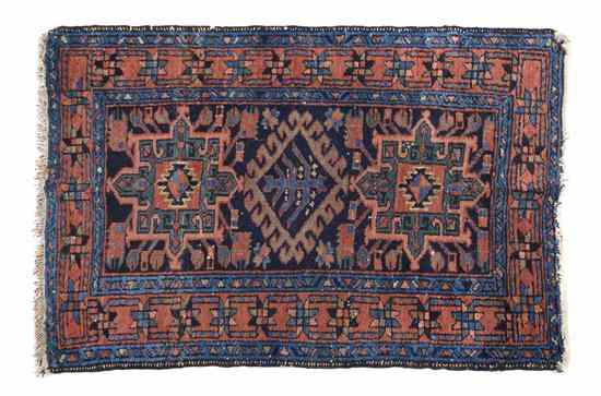 Appraisal: A Collection of Four Persian Wool Rugs of various decoration