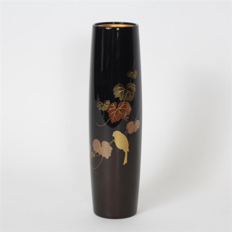 Appraisal: Japanese black lacquer vase featuring metallic leaves and bird design