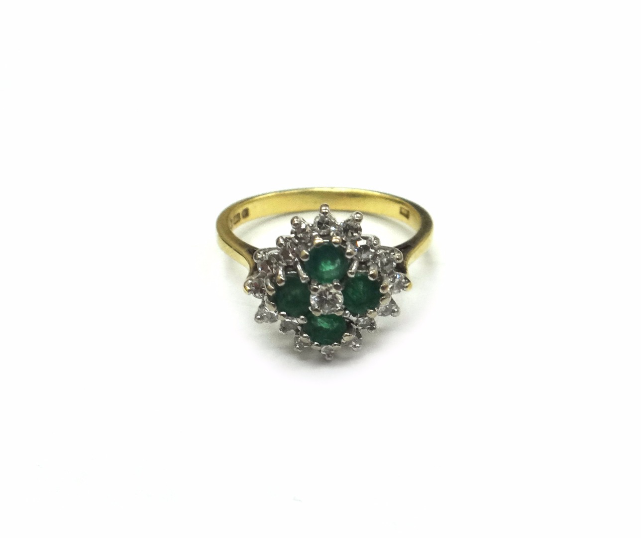 Appraisal: An ct gold emerald and diamond oblong cluster ring with