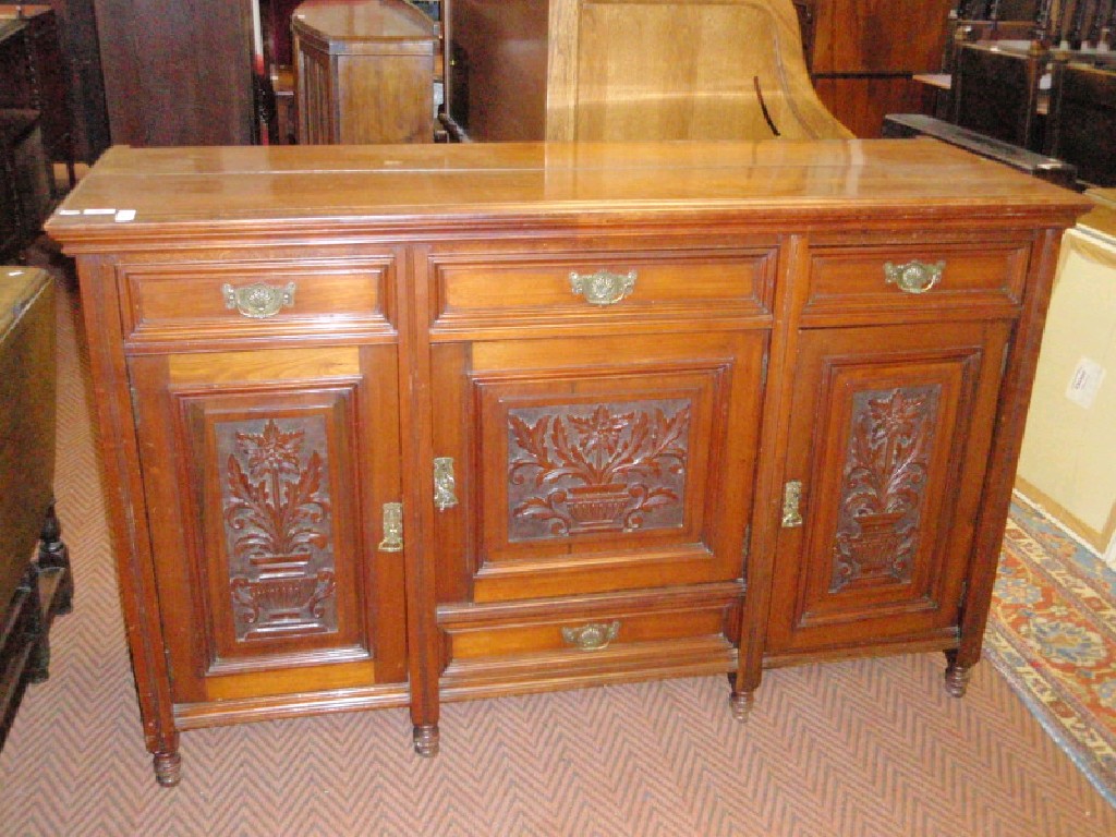 Appraisal: A late Victorian carved walnut dresser base