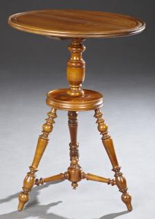 Appraisal: French Carved Cherry Circular Lamp Table th c the dished