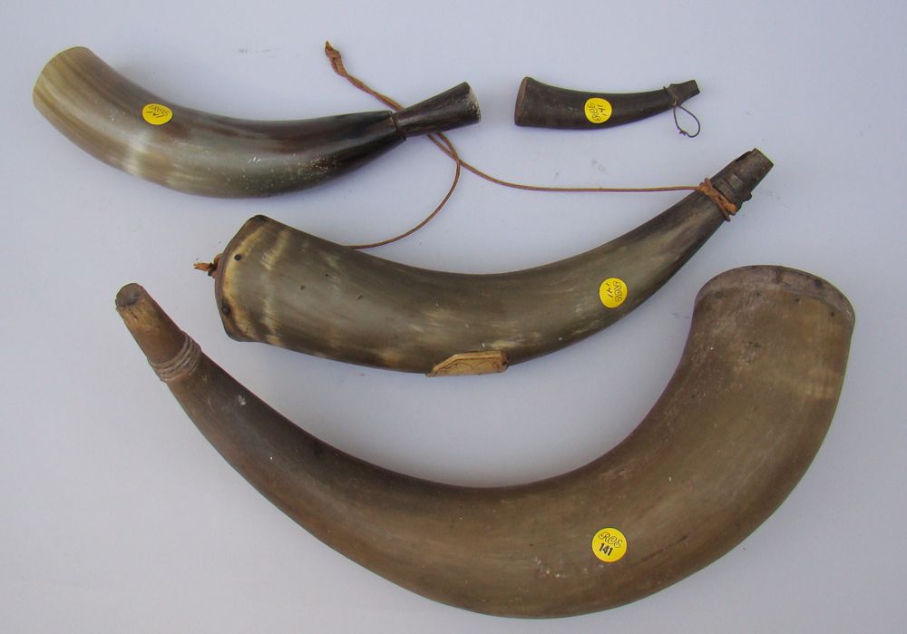 Appraisal: FOUR ANTIQUE AMERICAN POWDER HORNS Two not engraved one engraved