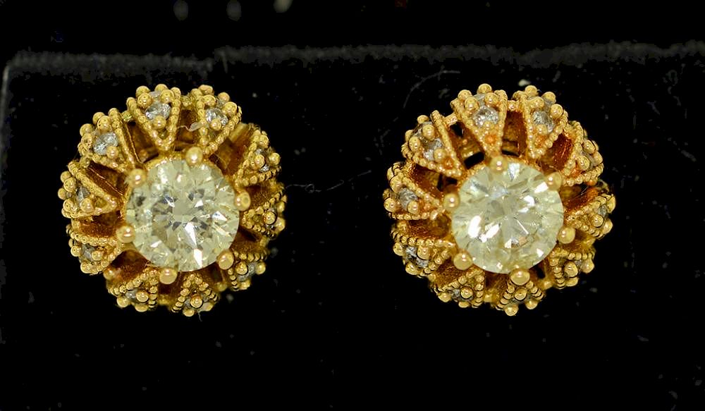 Appraisal: k Diamond Earrings k yellow gold diamond earrings floral leaves