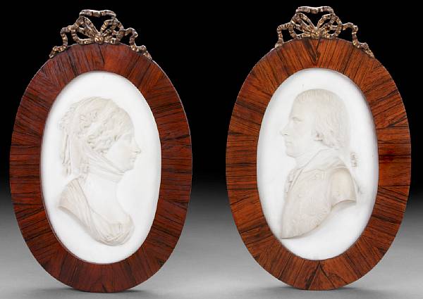 Appraisal: A pair of carved marble portrait plaques th century Depicting