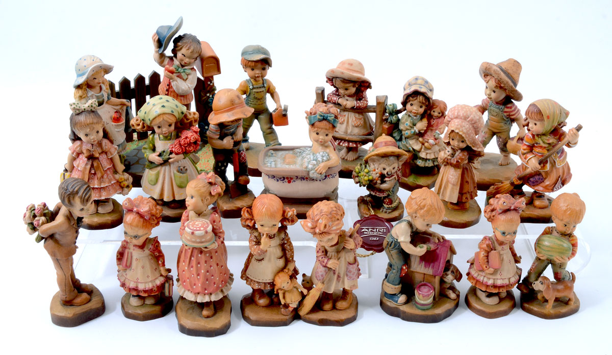 Appraisal: SARAH KAY ANRI ITALIAN CARVED WOOD FIGURINES An assembled collection