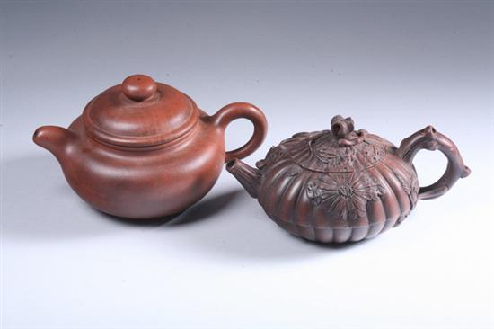 Appraisal: TWO CHINESE YIXING POTTERY TEA POTS Each with maker's mark