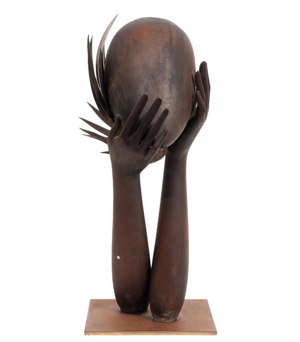 Appraisal: FRANZ HAGENEUER 'FACE AND HANDS' METAL SCULPTUREFranz Hagenauer Austria -