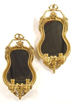 Appraisal: A pair of th century giltwood and gesso girandoles of