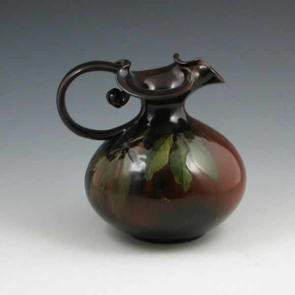 Appraisal: Lonhuda standard glaze ewer with Virginia creeper decoration Marked Lonhuda