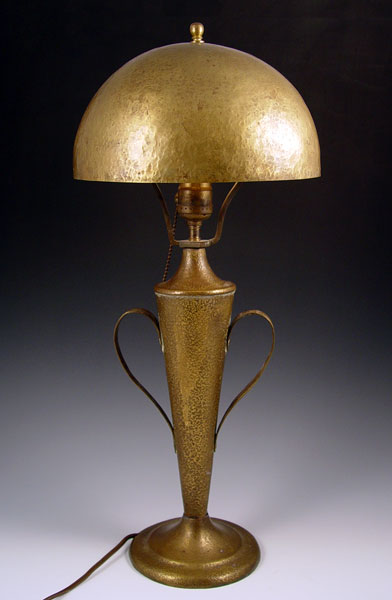 Appraisal: ARTS CRAFTS PERIOD HAMMERED BRASS TABLE LAMP Domed shade double