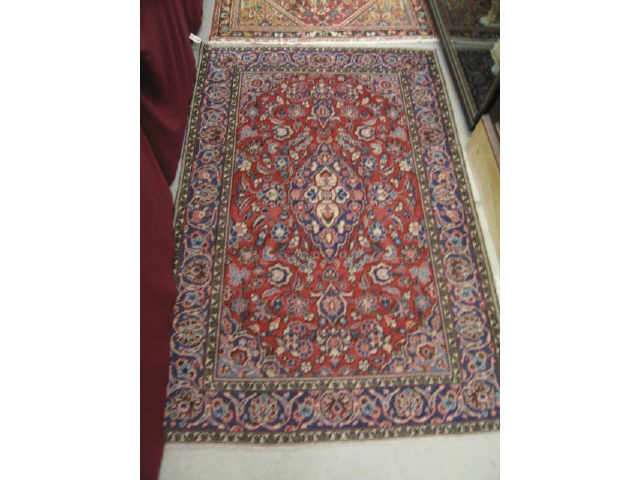 Appraisal: Kashan Persian Handmade Rug floral designs reds blues ivory '