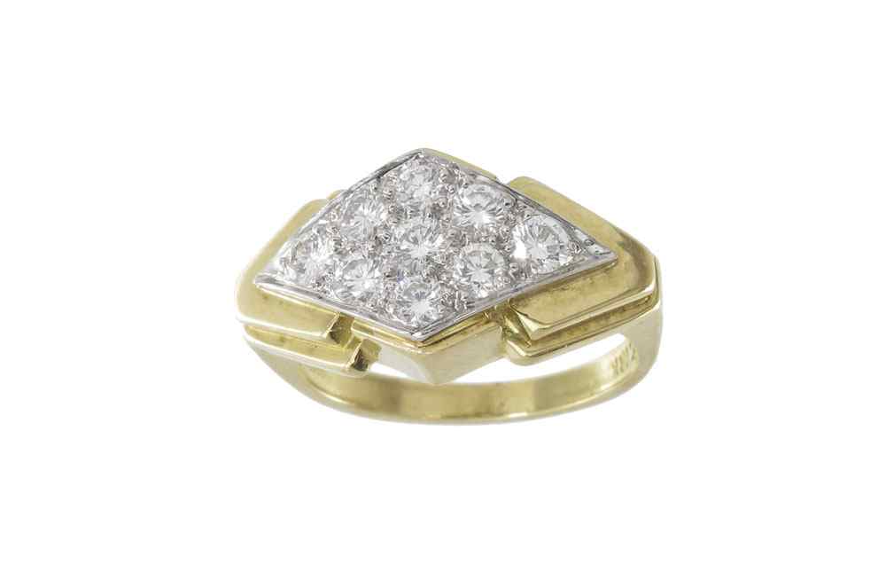 Appraisal: DAVID WEBB DIAMOND RING K yellow gold and platinum ring