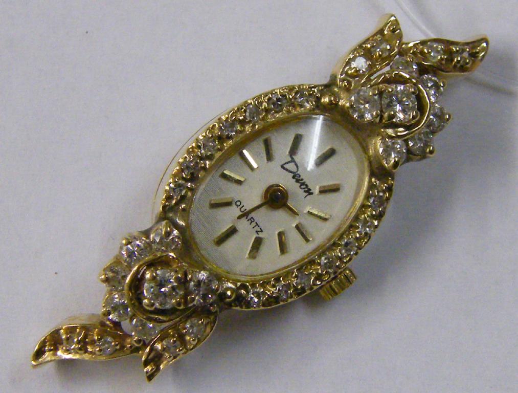 Appraisal: Attractive k diamond set lady's wristwatch the oval dial signed