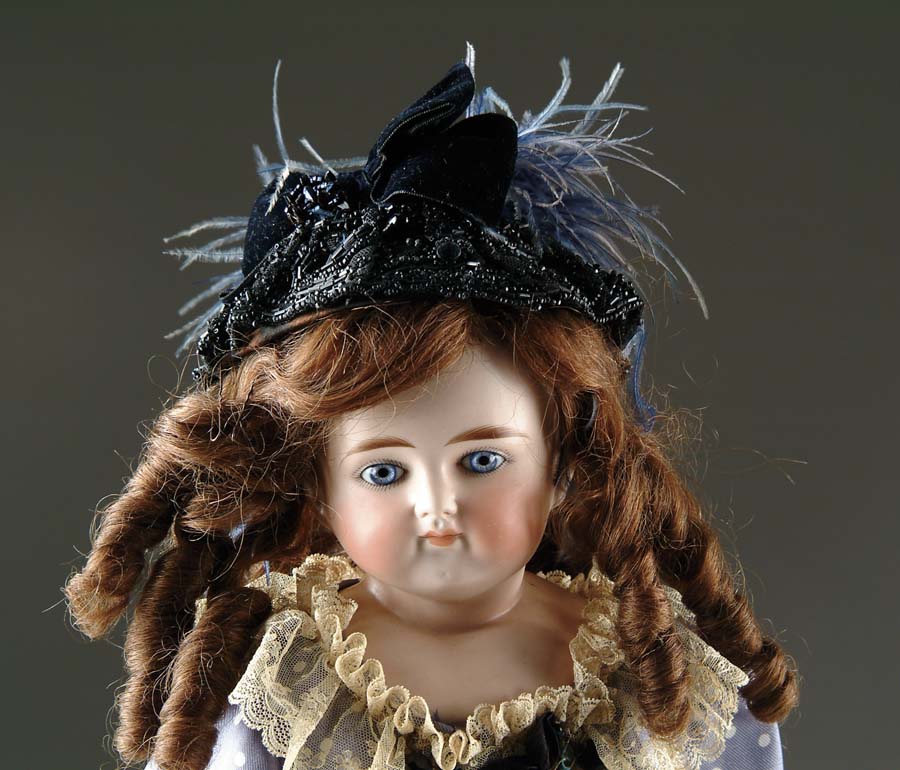 Appraisal: CLOSE MOUTH GLASS EYED SOLID DOME TURNED SHOULDER HEAD DOLL